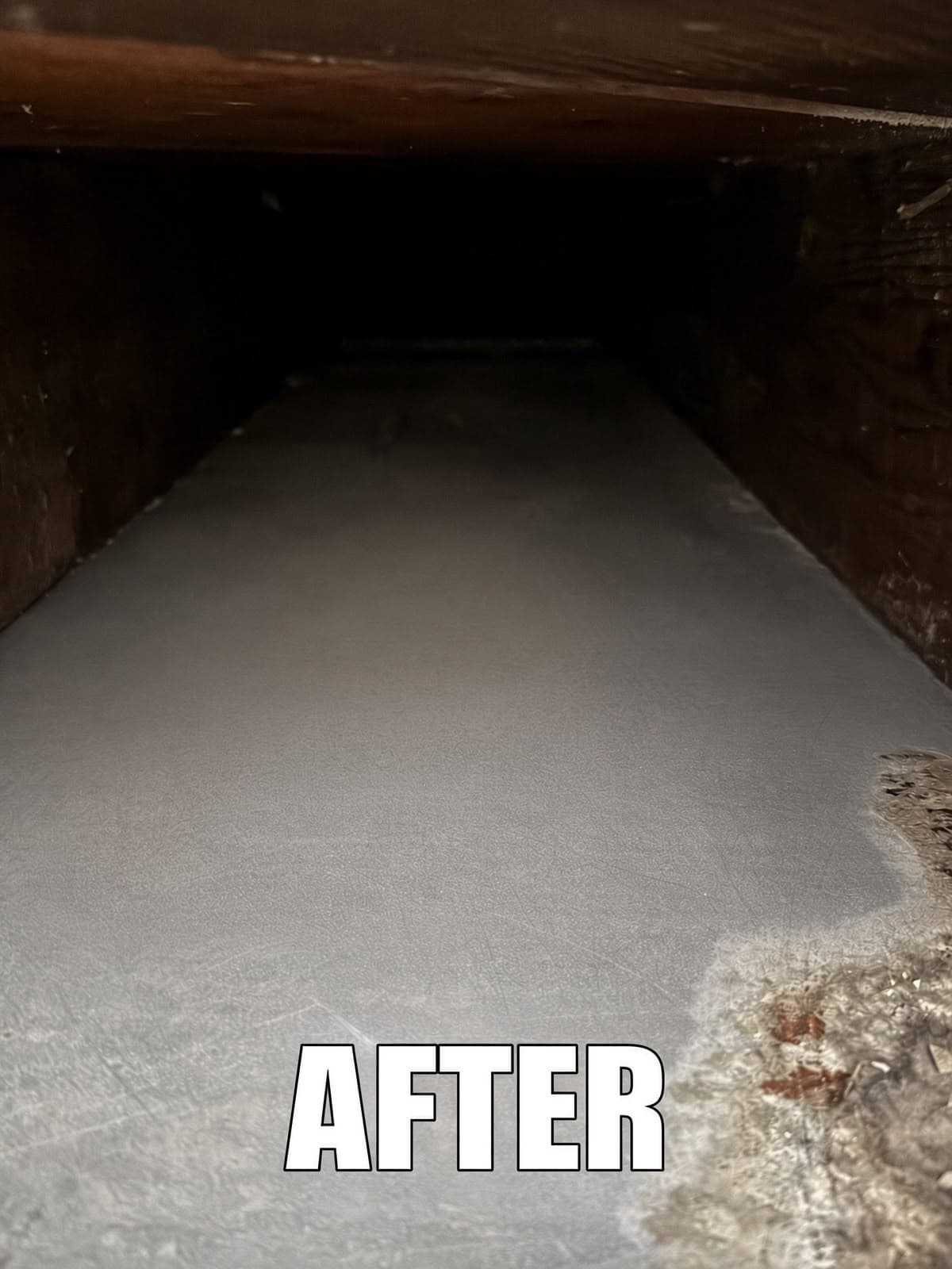Clean gray surface inside a dark wooden air duct with white text overlay reading AFTER.