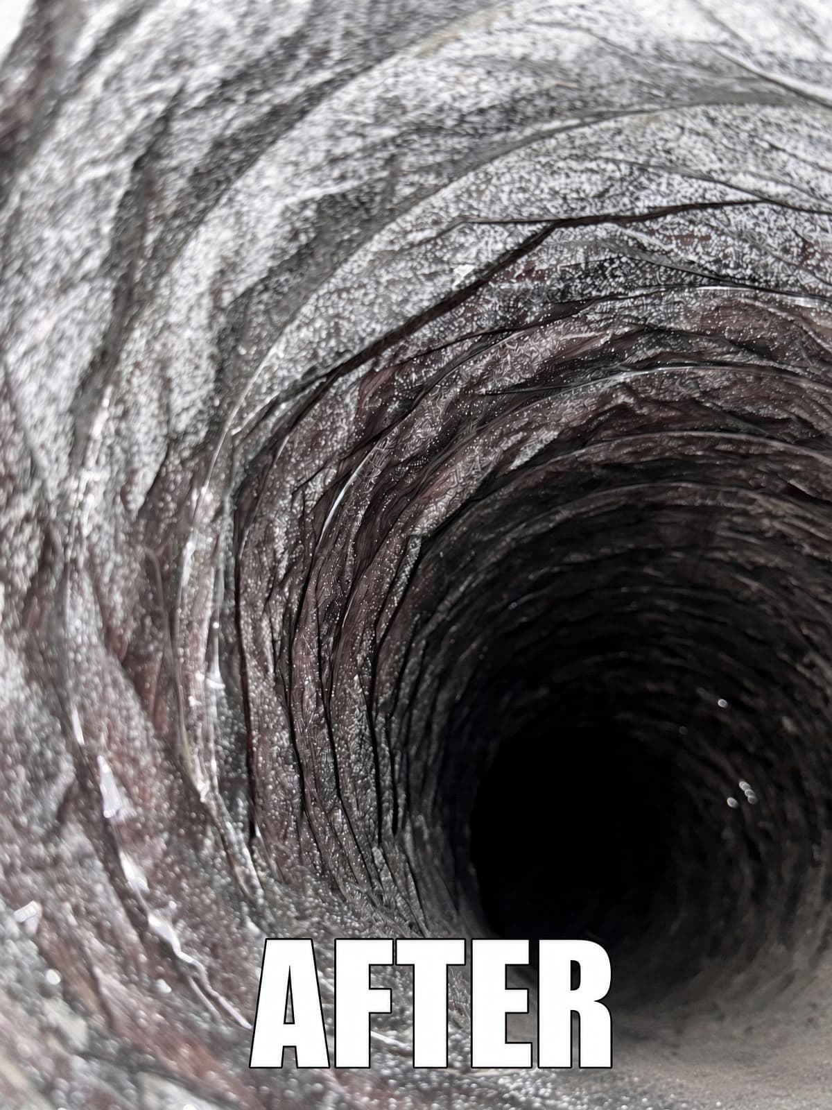 Clean, ribbed interior of a flexible silver air duct with the word AFTER overlaid.